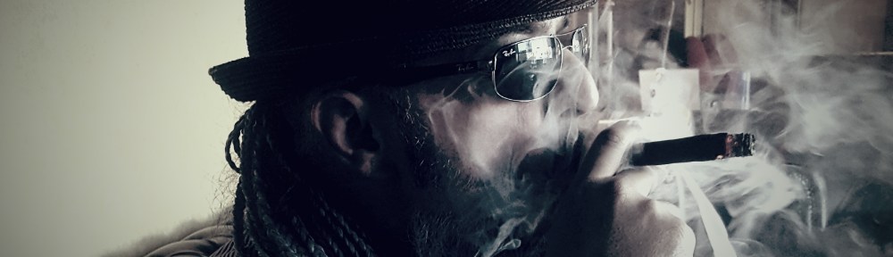 Oz G. Smoking a Cigar